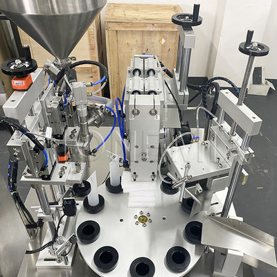 Macchina di riempimento e sigillamento di tubi di plastica ad ultrasuoni a rotazione semiautomatica