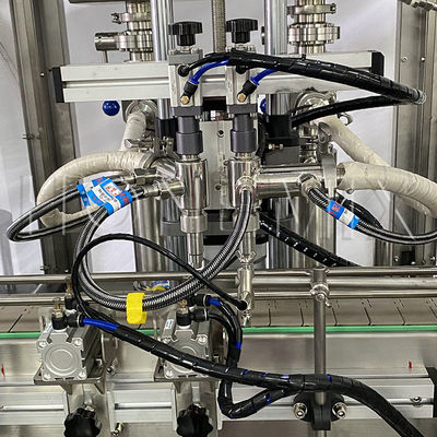 Macchina di riempimento di crema di vaselina riscaldata due ugelli di copertura di sigillamento di etichettatura