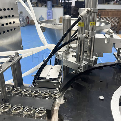 Macchine per riempimento di liquidi a doppia testa Equipaggiamento per riempimento di flaconcini OEM ad alta velocità