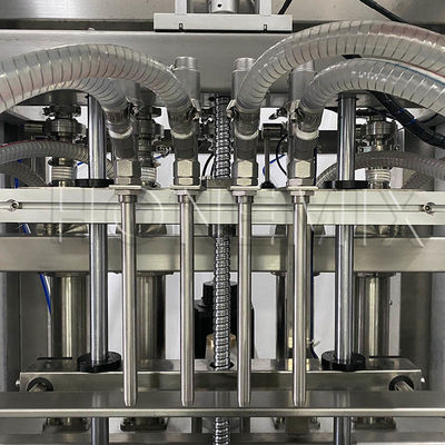 Macchina di riempimento di crema a quattro teste a controllo servo Macchina di riempimento di lozioni per il corpo