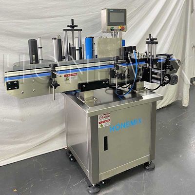 Macchina di etichettatura automatica per adesivi verticali personalizzata per bottiglie rotonde