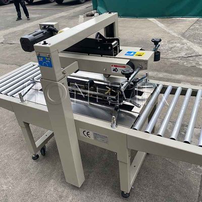 220V / 50HZ macchina di imballaggio automatico 12mm cartone scatola sigillante adesivo nastro