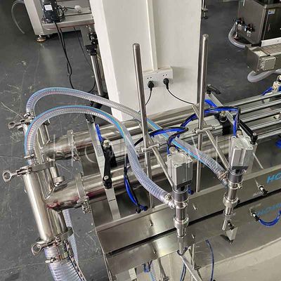 Cosmetici Macchina di riempimento a due teste Macchina di riempimento orizzontale a pistone CE