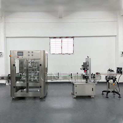 Macchina di riempimento automatico di bottiglie liquide SS 50Hz Macchina di riempimento di olio per capelli