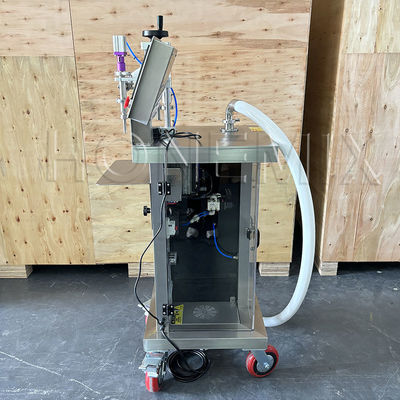 Macchina semiautomatica di riempimento di flaconi di sapone liquido e di bottiglie di profumo